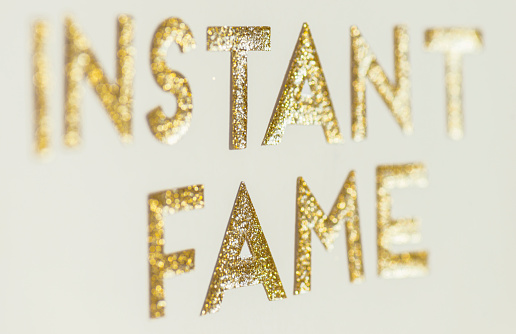 Instant fame. Shiny gold letters.