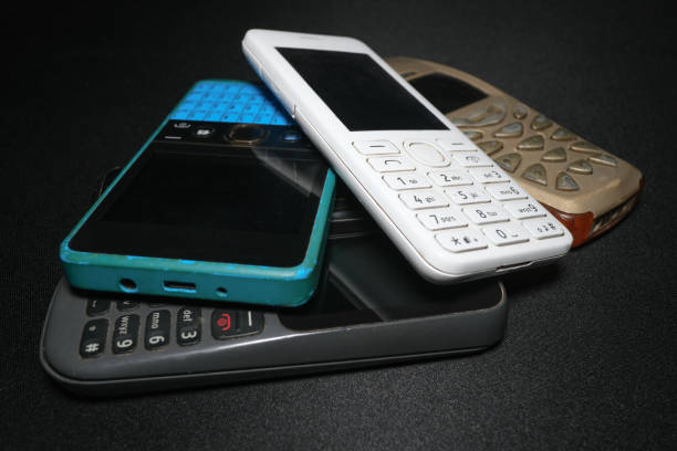 istock Pile of old gen mobile phones devices,technology evolution concept 1298609036