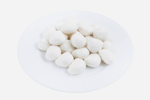 istock Fresh aromatic mozzarella cheese  in glass plate isolated on the white background 1298610188