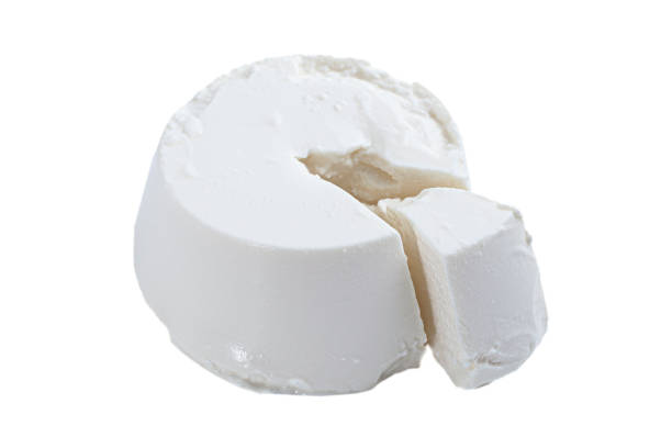 istock Fresh aromatic ricotta cheese  isolated on the white background 1298610210