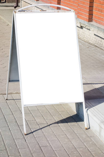 istock Blank advertising stand on the pavement 1298611797