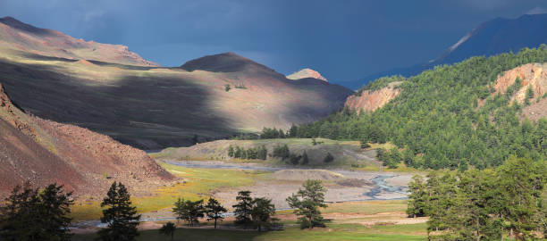 istock Mountain, contrast of light and stormy sky. 1298612879