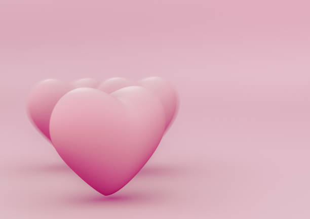 istock 3d hearts on a clean pink background 1298612960