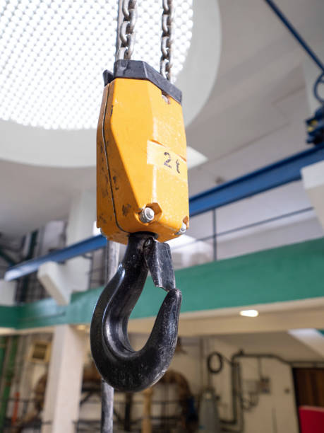 istock Industrial lifting crane hook and steel 1298613143