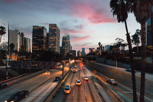 istock Traffic in Los Angeles Downtown at night 1298615042