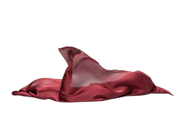 istock Flowing red silk scarf isolated on white background. 1298616309