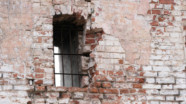 istock Old brick wall of a house 1298616577