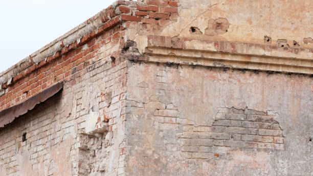 istock Old brick wall of a house 1298616587