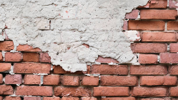 istock Old brick wall of a house 1298616675