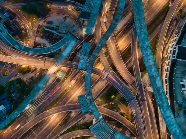 istock drone view directly above night scene city with elevated road bridges cross junction 1298618202
