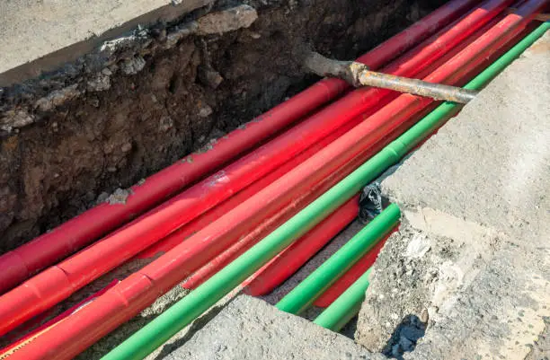 Photo of Multiple pipes under the road surface