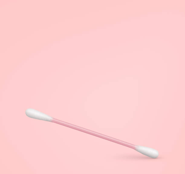 istock Cotton swab on pink background 1298621774