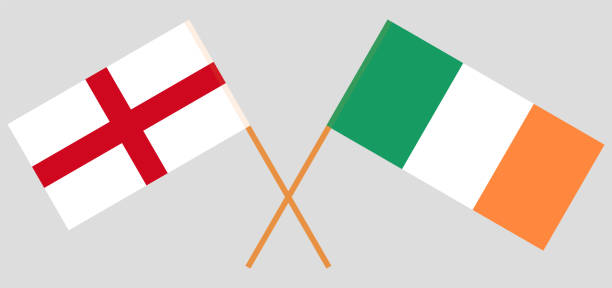 gekreuzte flaggen von england und irland - irish culture republic of ireland irish flag sport stock-grafiken, -clipart, -cartoons und -symbole