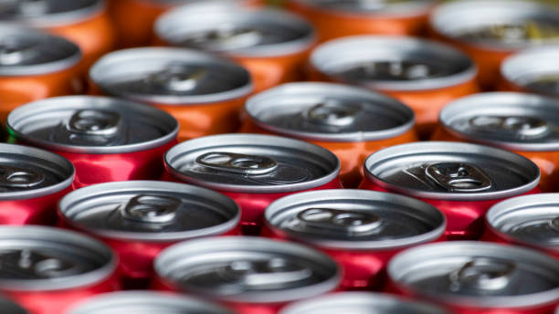 istock Colorful drink cans, close-up. 1298624584