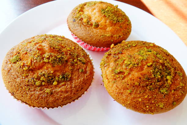 istock delicious snack mini pistachio cupcakes 1298626910