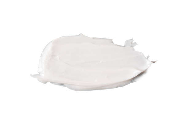 istock white cosmetic face cream texture on white background 1298627535