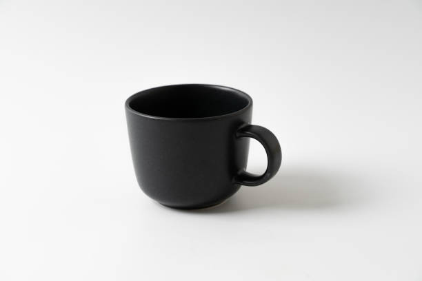 istock black color coffee mug on white background 1298627651