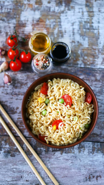 istock Chinese noodle bowl with spices. 1298628653