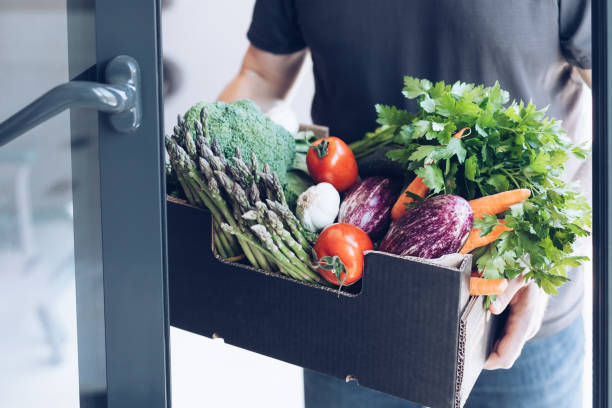 istock Fresh organic greens and vegetables delivery 1298629212