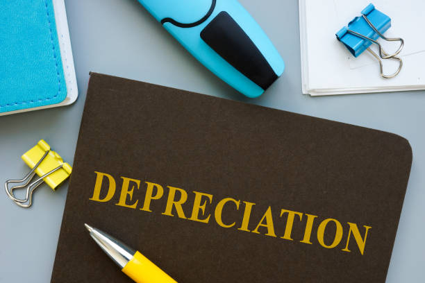 istock Book about Depreciation and pen on the table. 1298629343