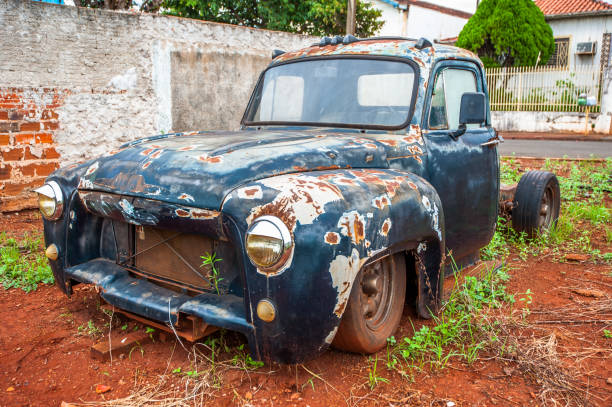 istock scrap car. old vehicles for recycling 1298630605