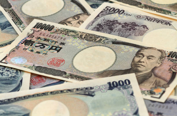 istock Japanese paper money background 1298631870