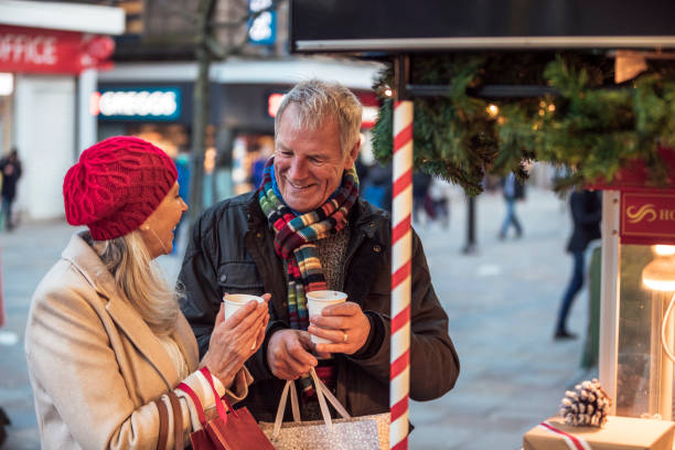 istock Senior Couple Buying Mulled Wine 1298648709