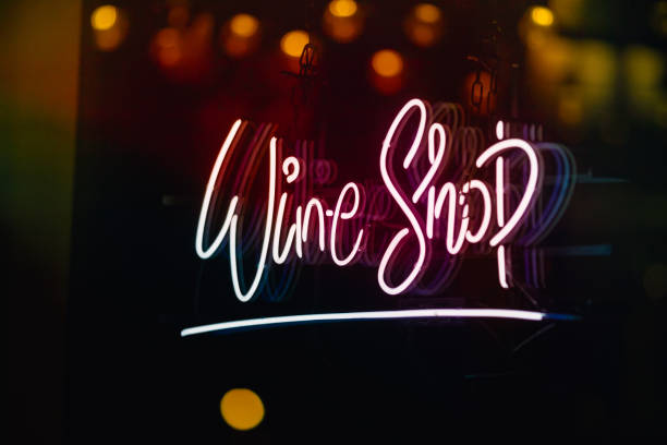 istock Glowing wine shop neon sign 1298649622