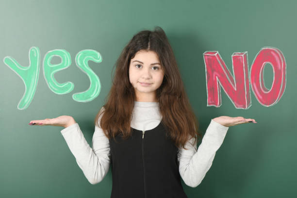 istock Pre-adolescent child breed arms to the sides and equalizes the options 1298651603