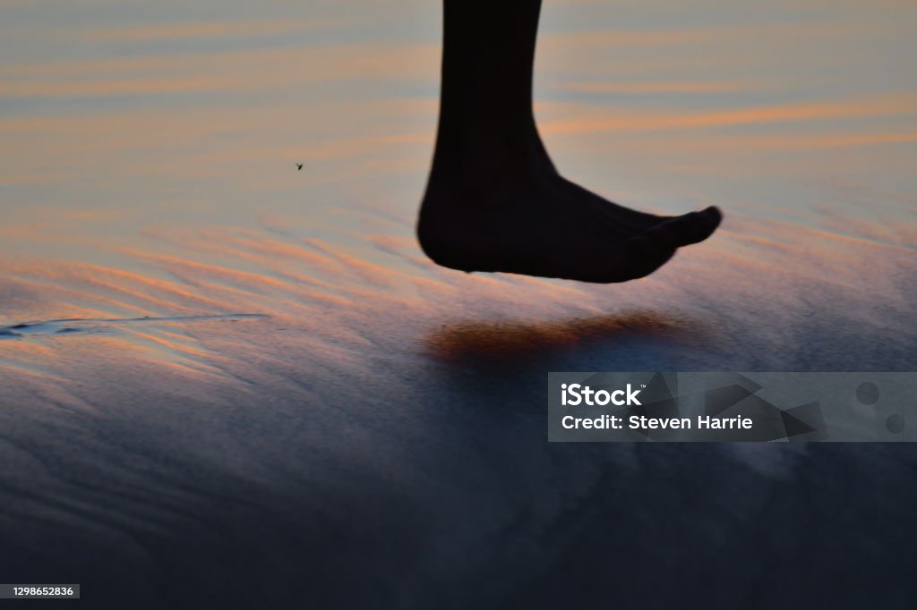 Beach Sand at Sunset With Runners Foot Redondo Beach Beach Stock Photo