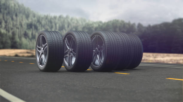 istock 3d render 4 car wheels driving on the road 1298654156
