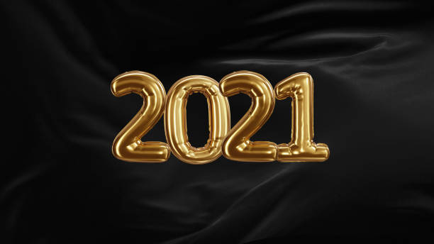 istock 3d render Inscription 2021 from golden balloons of black silk developing fabric 1298654192
