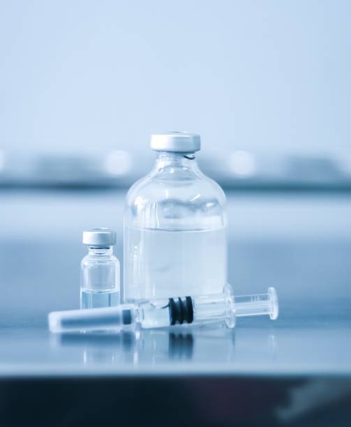 Vial dose flu shot drug needle syringe,concept medical test vaccine. Selective focus stock photo