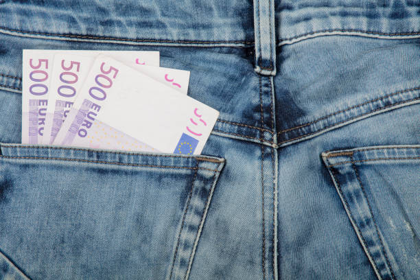 istock Euro paper currency banknotes in jeans back pocket 1298660279
