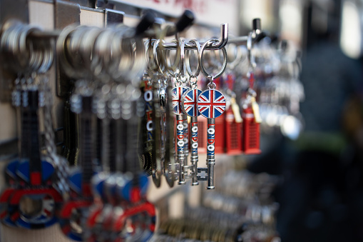 Many keychain and in detail a key with United Kingdom flag on it