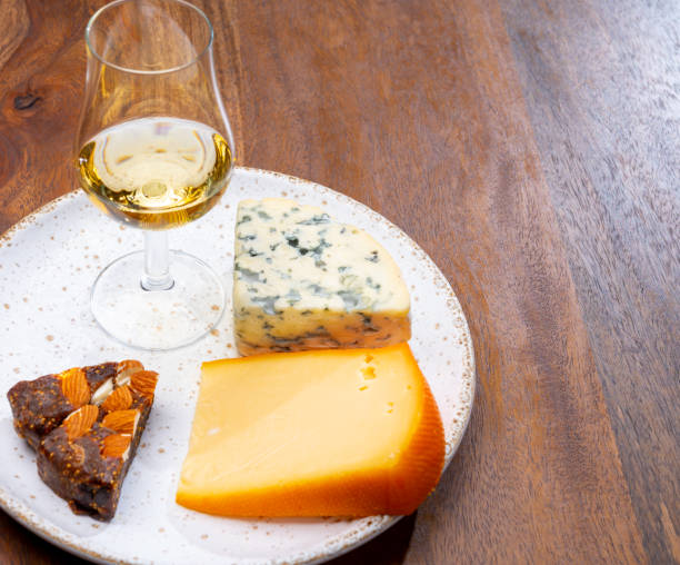 istock Tasting and pairing of different cheeses with strong alcoholic drinks, whisky, cognac or calvados 1298664584