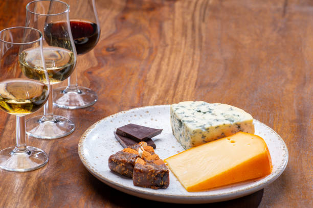 istock Tasting and pairing of different cheeses with strong alcoholic drinks, whisky, cognac or calvados 1298664690