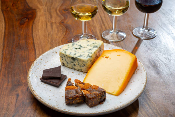 istock Tasting and pairing of different cheeses with strong alcoholic drinks, whisky, cognac or calvados 1298664693