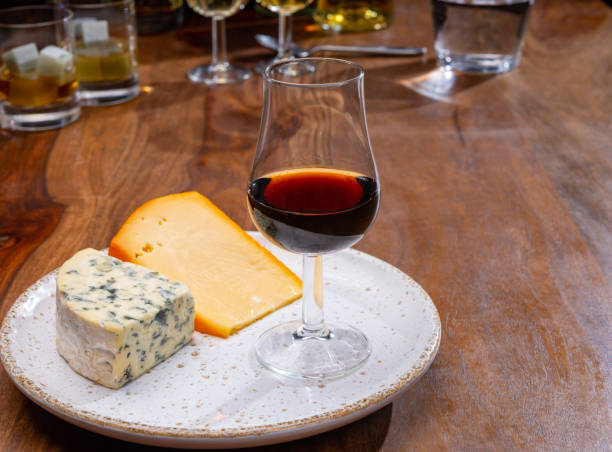 istock Tasting and pairing of different cheeses with strong alcoholic drinks, whisky, cognac or calvados 1298664696