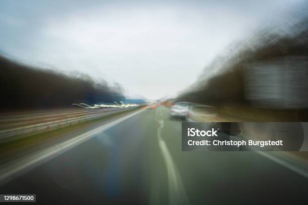 Decreasing Concentration And Distraction In Road Traffic Stock Photo - Download Image Now