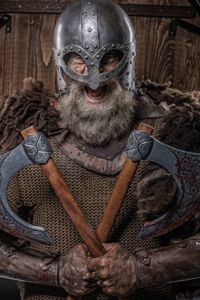 istock Weapon wielding senior viking warrior in studio shot 1298675728