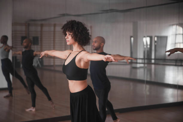 istock Dance teacher with group of students dance rehearsal in studio 1298676269