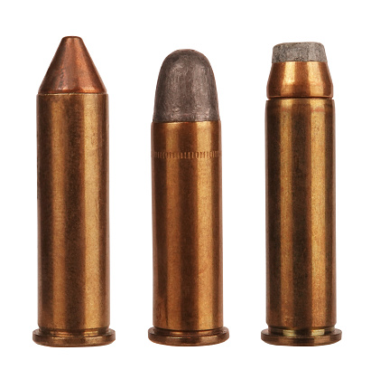 Here are three kinds of Mighty handgun ammunition weapon bullets isolated on white background.