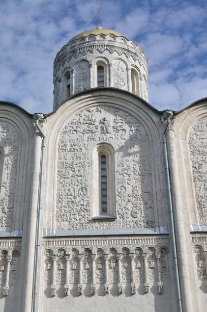 istock Monumental medieval orthodox cathedral which facade is covered with numerous elaborate relief figures. Named after prince Dmitry who built it in Vladimir city in XII century before Mongolian invasion. 1298679030