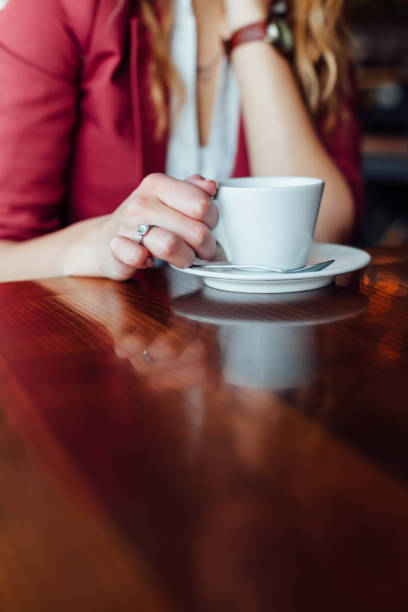 istock Woman In A Cafe 1298679231