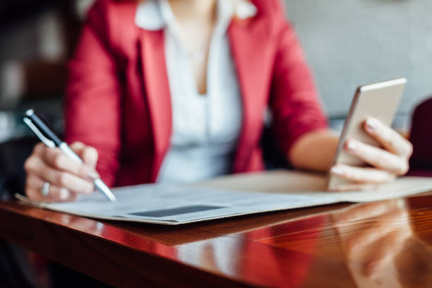 istock Business Woman In A Cafe 1298679893