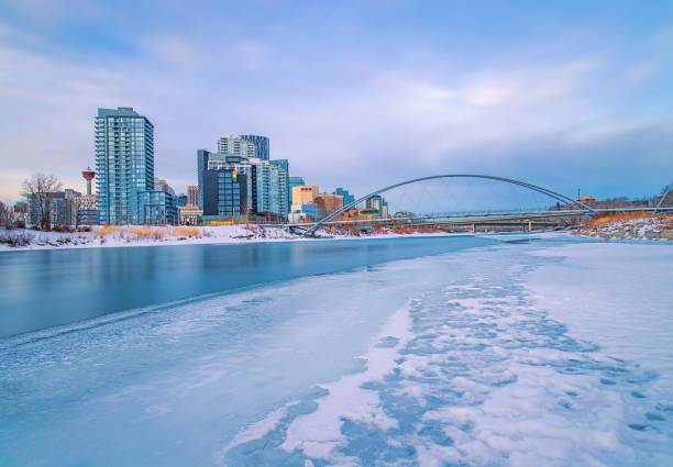 istock Long Exposure Sunrise Over An Icy Bow River 1298681474