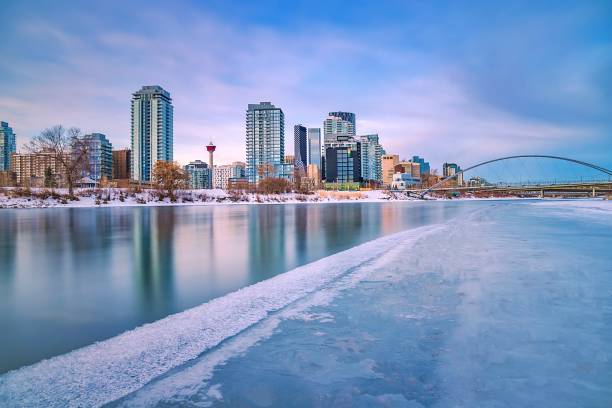 istock Long Exposure Sunrise Over An Icy Bow River 1298681703