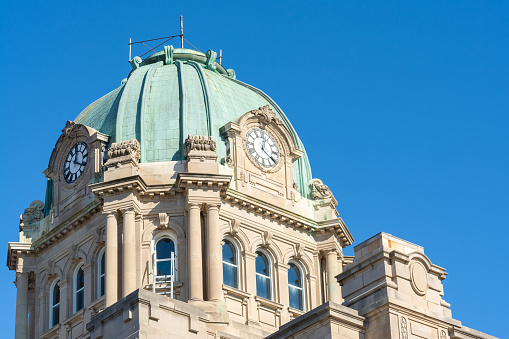 The Franklin County Courthouse, located in Courthouse Square on Main Street in Ottawa, is the seat of government of Franklin County, Kansas. The courthouse was built in 1892. Architect George P. Washburn designed the courthouse in the Romanesque Revival style; the red brick courthouse is considered one of Washburn's \