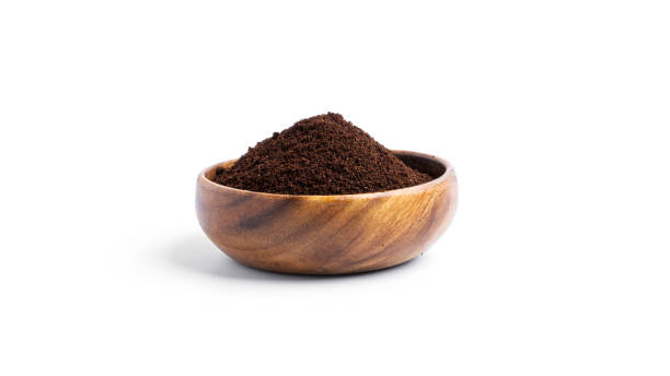 istock Coffee in wooden bowl isolated on a white background 1298687712